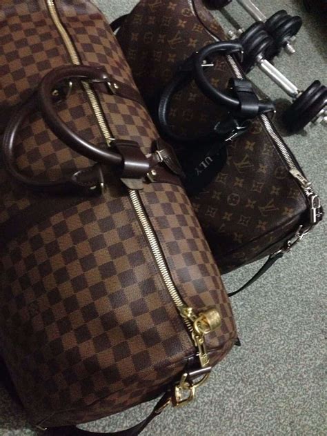 louis vuitton keepall 55 real vs fake|louis vuitton 55 carry on.